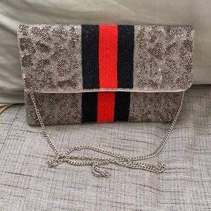 Red, black and silver beaded clutch